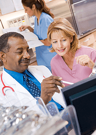 Doctor and nurse collaborating in a medical setting